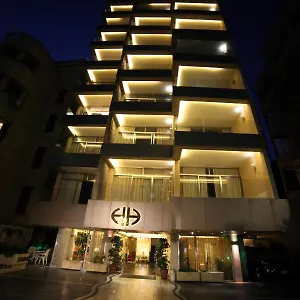 Holiday Home Suites فندق